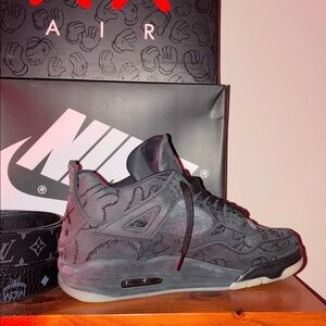Jordan 4 Black Kaws